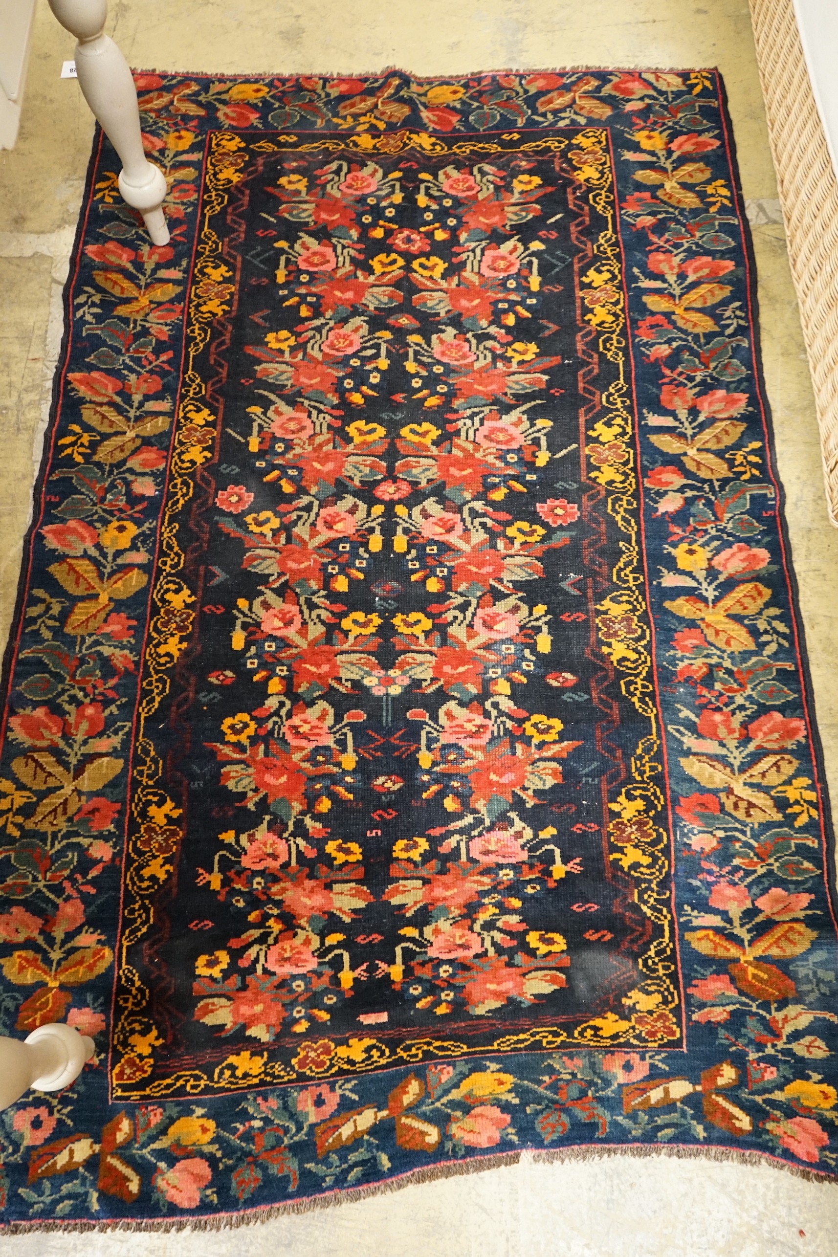 A Kirman style blue ground floral rug, 160 x 105cm